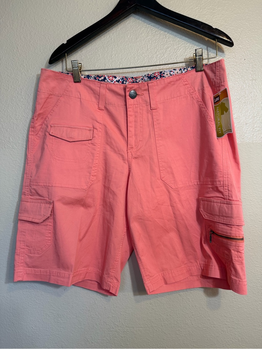 Lee women's coral pink cargo Bermuda shorts natural fit with cargo pockets.